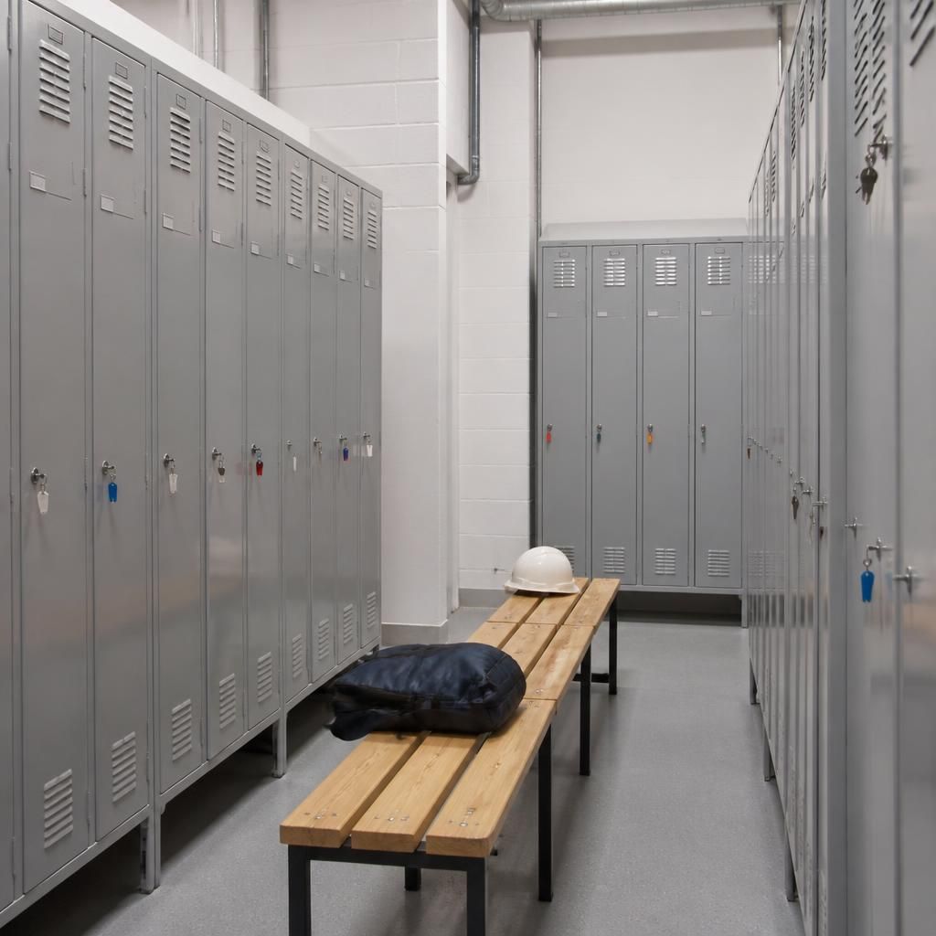 Steel lockers arranged in an industrial workplace changing area